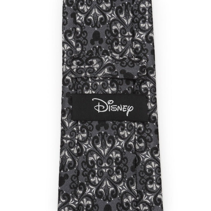 Disney Mickey Mouse Damask Tile Men’s Tie in black and gray silk with a repeating damask pattern, hidden silhouettes, and a Disney label on the back.
