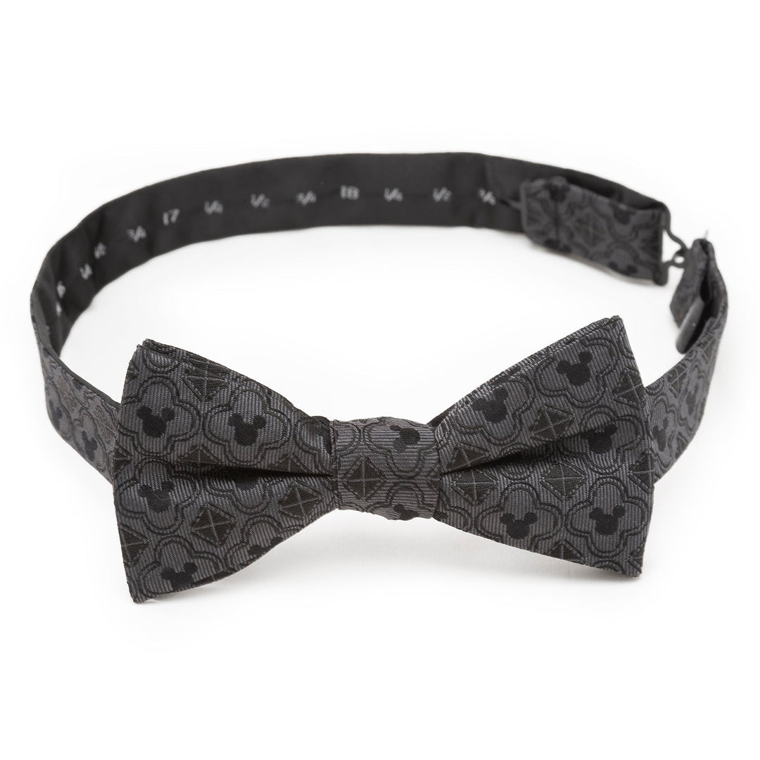 Disney Mickey Mouse Pattern Black Bow Tie featuring a repeating grey pattern of Mickey Mouse silhouettes inside geometric shapes.