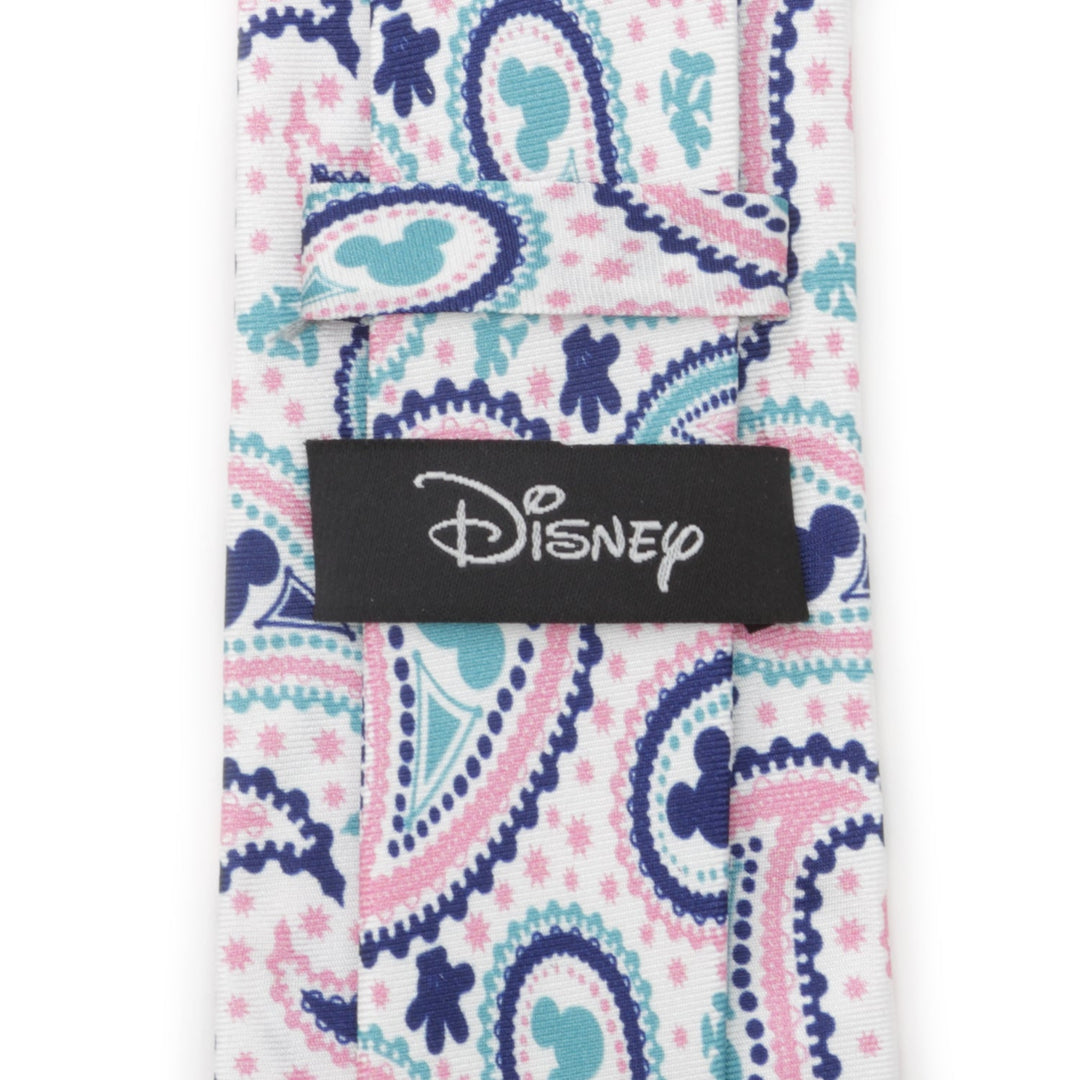 Disney Mickey Mouse Paisley Multi Men’s Tie in a white, pink, and blue paisley pattern featuring hidden Mickey Mouse silhouettes and a black Disney brand label on the back.