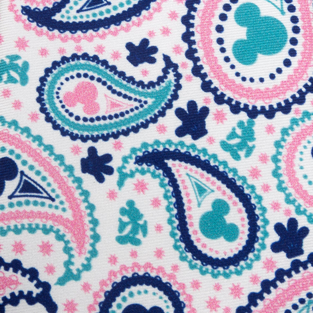 A Disney Mickey Mouse Paisley Multi Men’s Tie in blue, pink, and white featuring paisley patterns with silhouettes of Mickey Mouse heads.
