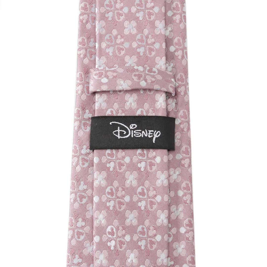 Disney Mickey Mouse Silhouette Blossom Pink Men’s Tie in dusty pink silk with a repeating white floral pattern and a black Cufflinks.com brand label on the back.