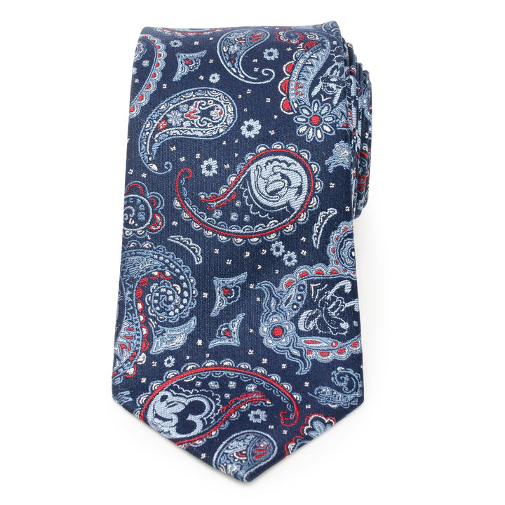 A navy blue Disney Mickey and Friends Paisley Blue Multi men’s tie featuring a white and red paisley pattern with hidden Mickey Mouse silhouettes.