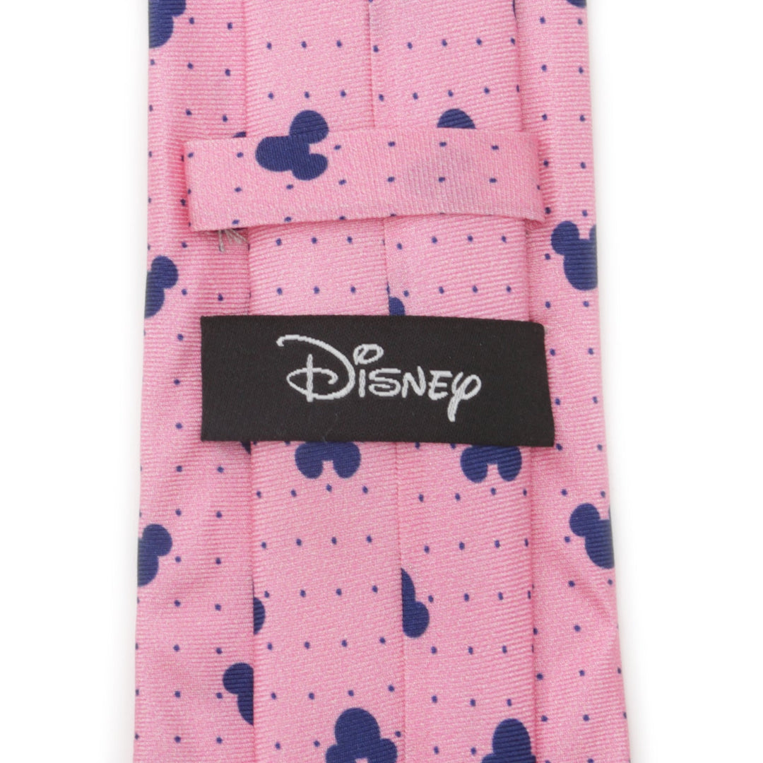 Disney Mickey Mouse Dot Pink Men’s Tie in silk with a repeating pattern of navy blue dots and Mickey Mouse head silhouettes, featuring a black brand label on the back.