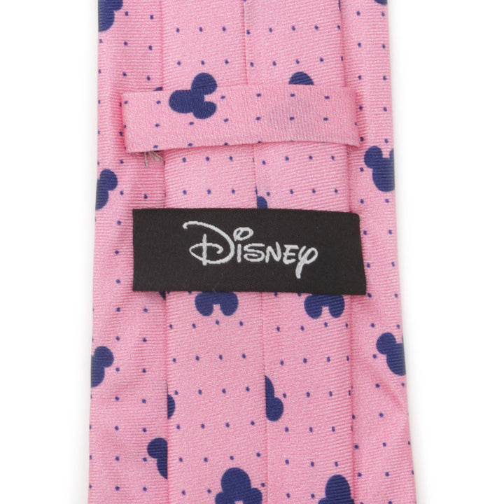 Disney Mickey Mouse Dot Pink Men’s Tie in silk with a repeating pattern of navy blue dots and Mickey Mouse head silhouettes, featuring a black brand label on the back.