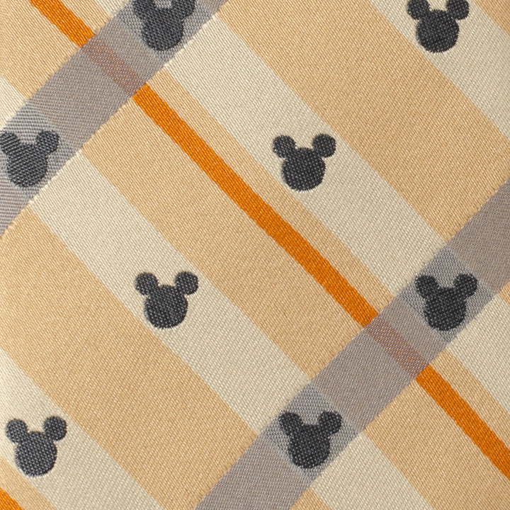 Disney Mickey Mouse Silhouette Tan Plaid Tie featuring a tan, gray, and orange plaid pattern with small black Mickey Mouse silhouettes.