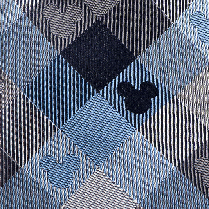 Disney Mickey Mouse Blue Plaid Mens Tie in blue and grey plaid with a repeating Mickey Mouse head silhouette pattern.