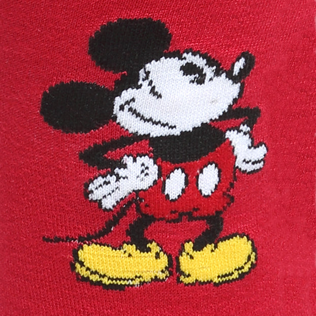 Red fabric patterned with a repeating illustration of Mickey Mouse wearing yellow shoes, shown as part of the Disney Mickey Mouse Pie-Eyed Red Sock and Mickey Blue Lapel Pin Gift Set.