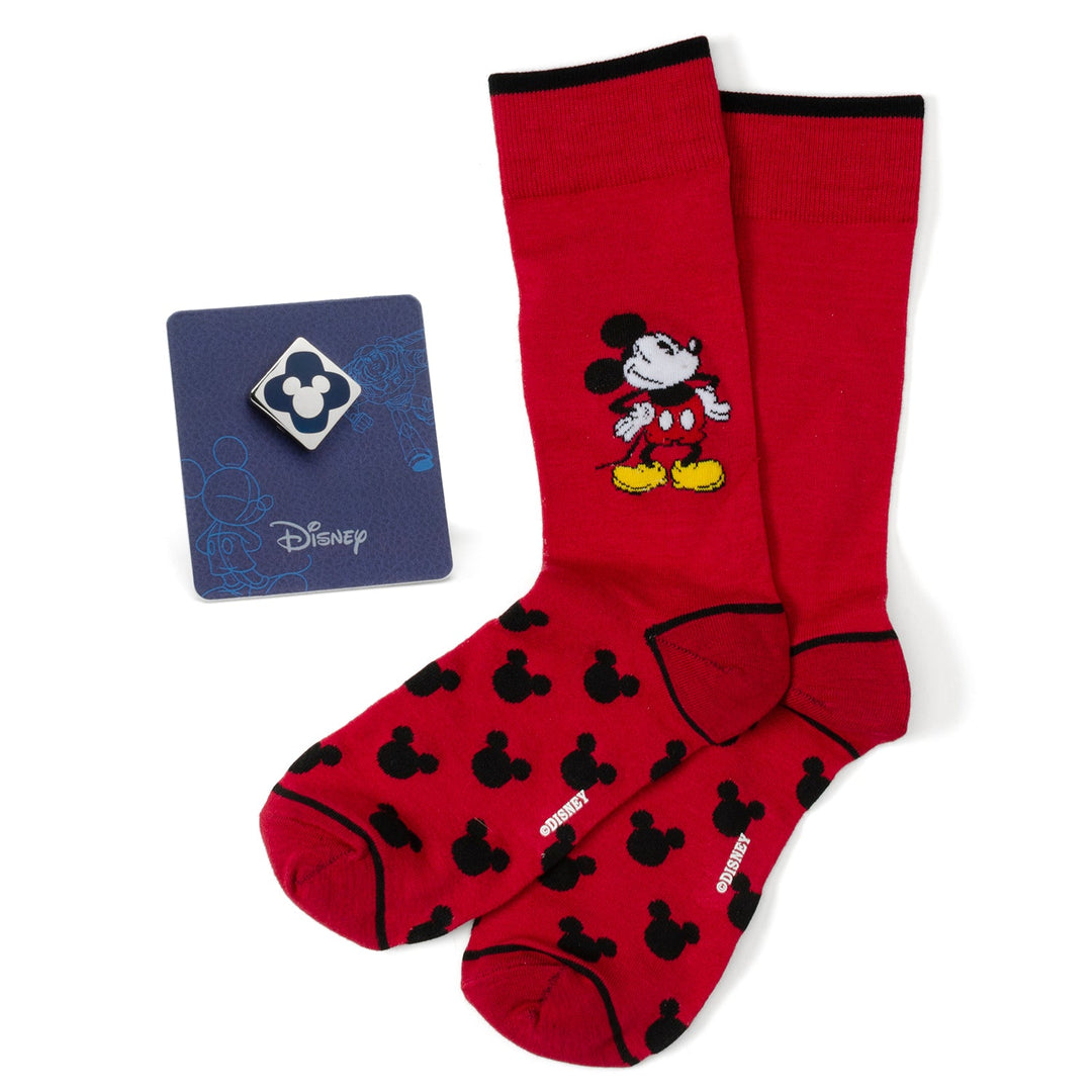 Disney Mickey Mouse Pie-Eyed Red Sock and Mickey Blue Lapel Pin Gift Set featuring red socks with a black silhouette pattern and a silver and blue icon pin on a backing card.