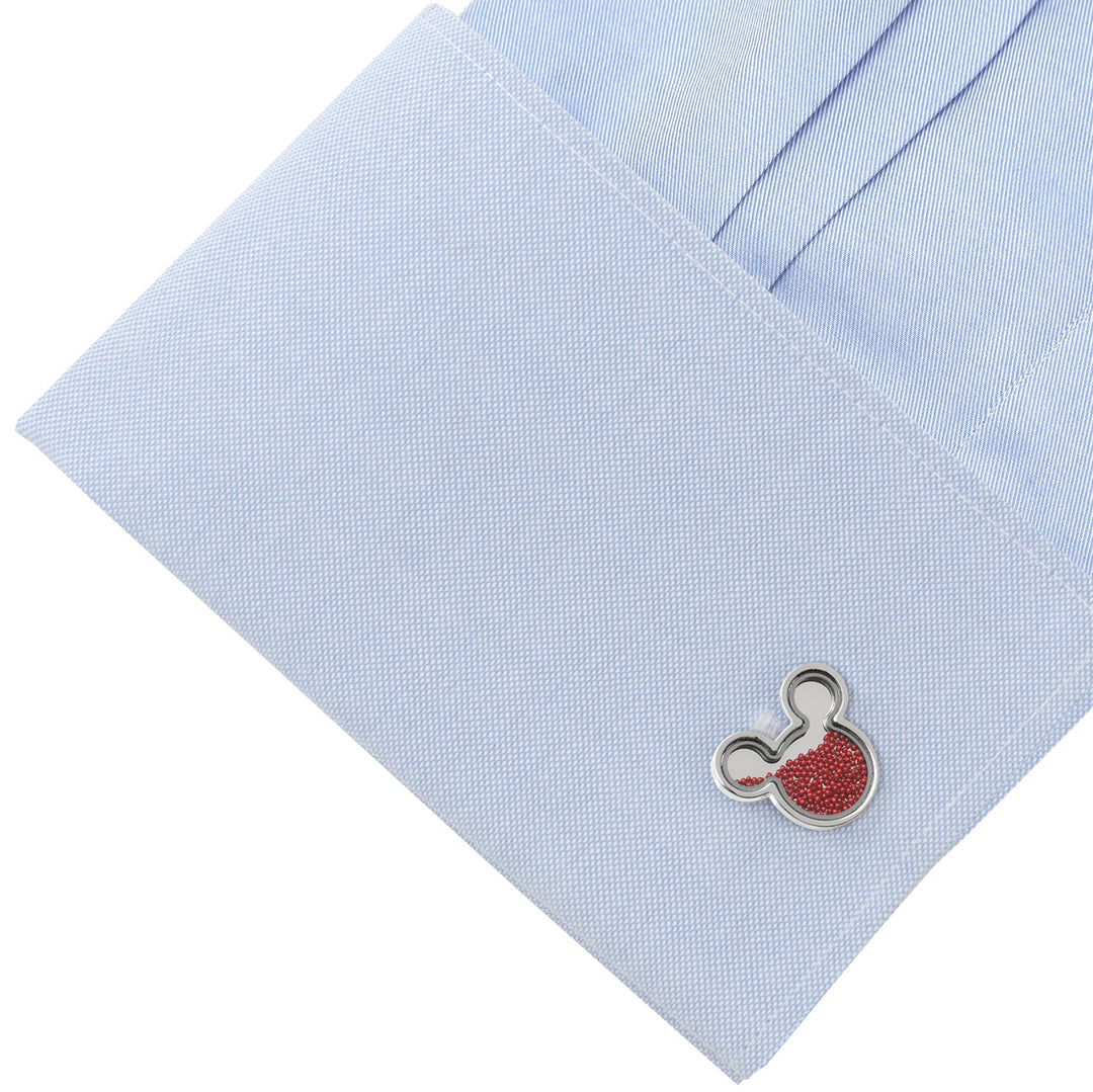 Disney Mickey Mouse Silhouette Red Caviar Bead Cufflinks featuring silver Mickey-shaped frames filled with small red beads, attached to a light blue dress shirt cuff.