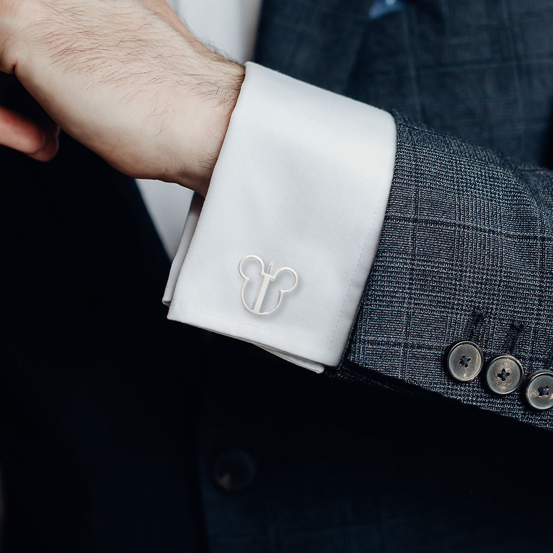 Disney Mickey Mouse Silhouette Cutout Cufflinks in stainless steel on a white dress shirt cuff.