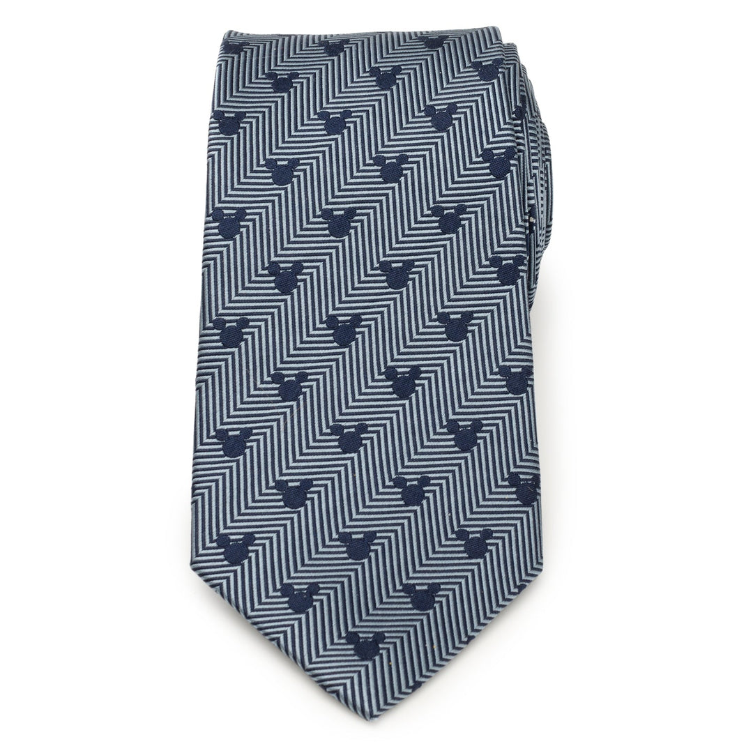 Disney Mickey Mouse Silhouette Blue Herringbone Men’s Tie in blue and grey silk with a herringbone pattern and small Mickey Mouse silhouettes.