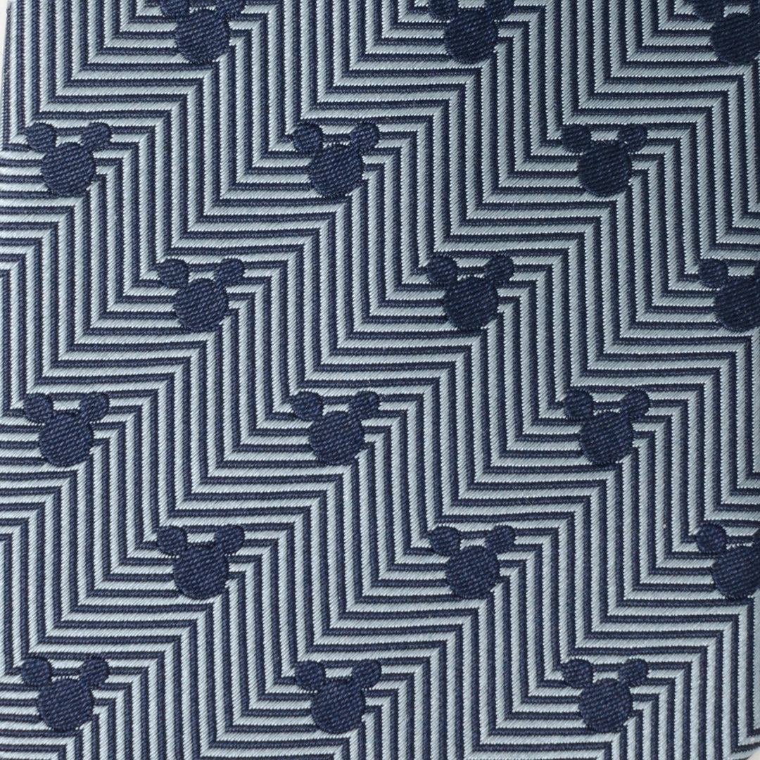 Disney Mickey Mouse Silhouette Blue Herringbone Men’s Tie in blue and grey herringbone with a geometric pattern featuring small dark Mickey Mouse silhouette icons.