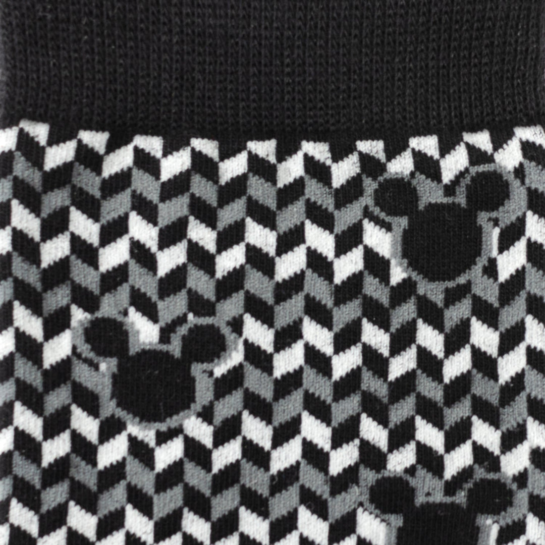 Disney Mickey Mouse Silhouette Chevron Sock and Mickey Blue Lapel Pin Gift Set featuring black, white, and grey chevron patterned knit socks with repeating Mickey Mouse head silhouettes.