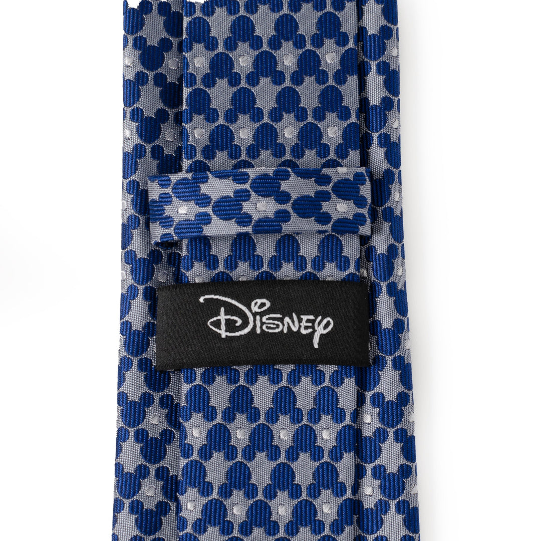 Blue Disney Mickey Mouse Silhouette Pattern Dot Blue Tie featuring a repeating pattern of grey silhouettes and small dots, with a black Disney label on the back.