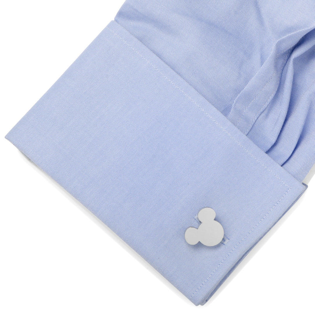 Disney Mickey Mouse Silhouette Stainless Steel Cufflinks fastened to a light blue dress shirt cuff.