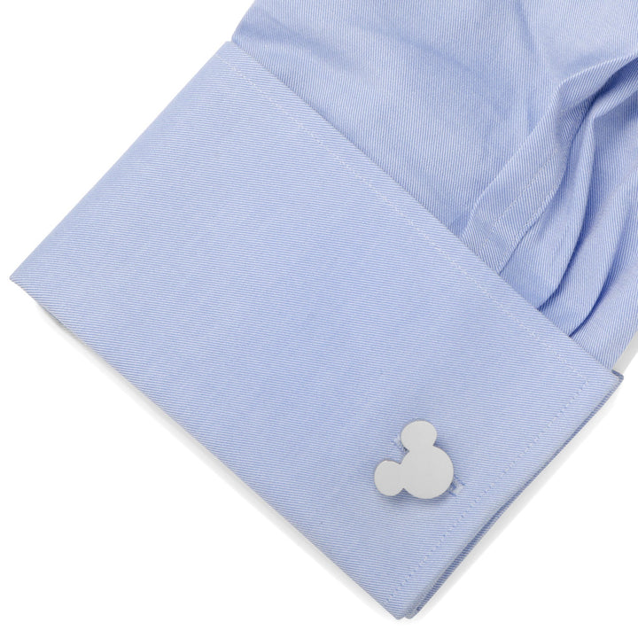Disney Mickey Mouse Silhouette Stainless Steel Cufflinks fastened to a light blue dress shirt cuff.