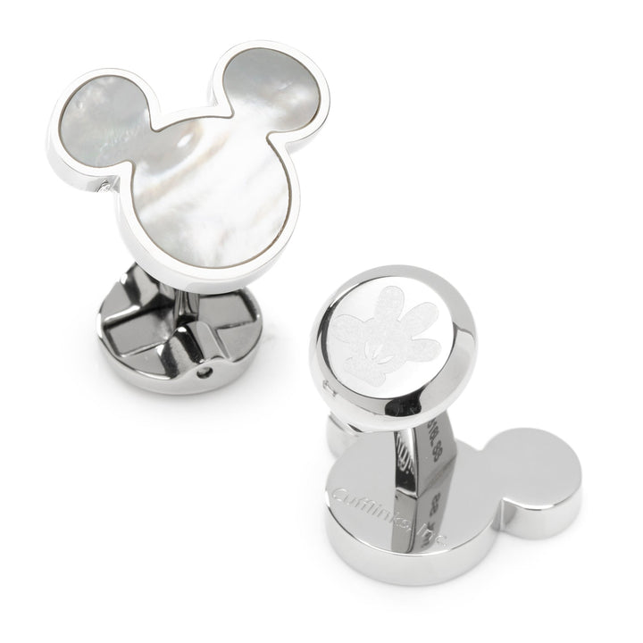 Disney Mickey Mouse Mother of Pearl Cufflinks: two silver cufflinks, one with a mother of pearl head inlay and one with an engraved glove emblem on a circular face.