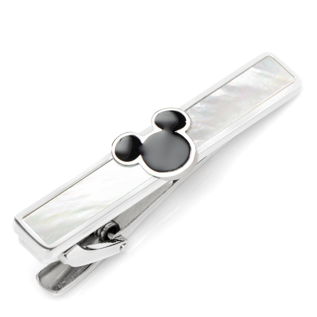 Disney Mickey Mouse Mother of Pearl Tie Clip made of sterling silver, inlaid with mother-of-pearl, and topped with a black Mickey Mouse icon.