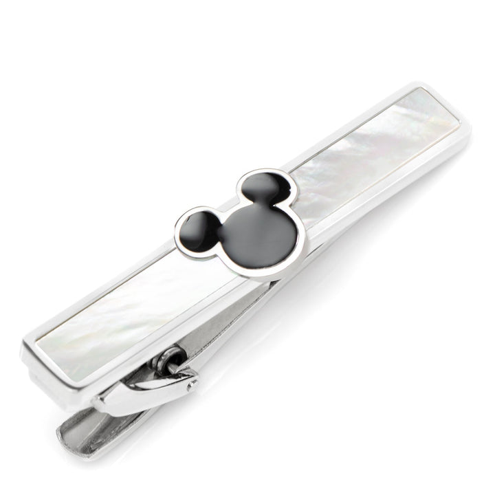 Disney Mickey Mouse Mother of Pearl Tie Clip made of sterling silver, inlaid with mother-of-pearl, and topped with a black Mickey Mouse icon.
