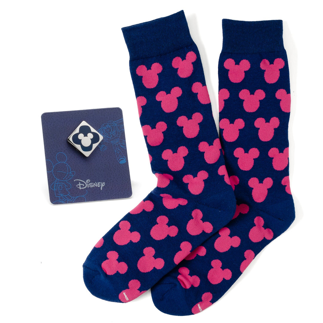 Disney Mickey Mouse Silhouette Pink Sock and Mickey Blue Lapel Pin Gift Set featuring blue crew socks with a pink Mickey silhouette pattern displayed next to a matching Mickey lapel pin on a card.