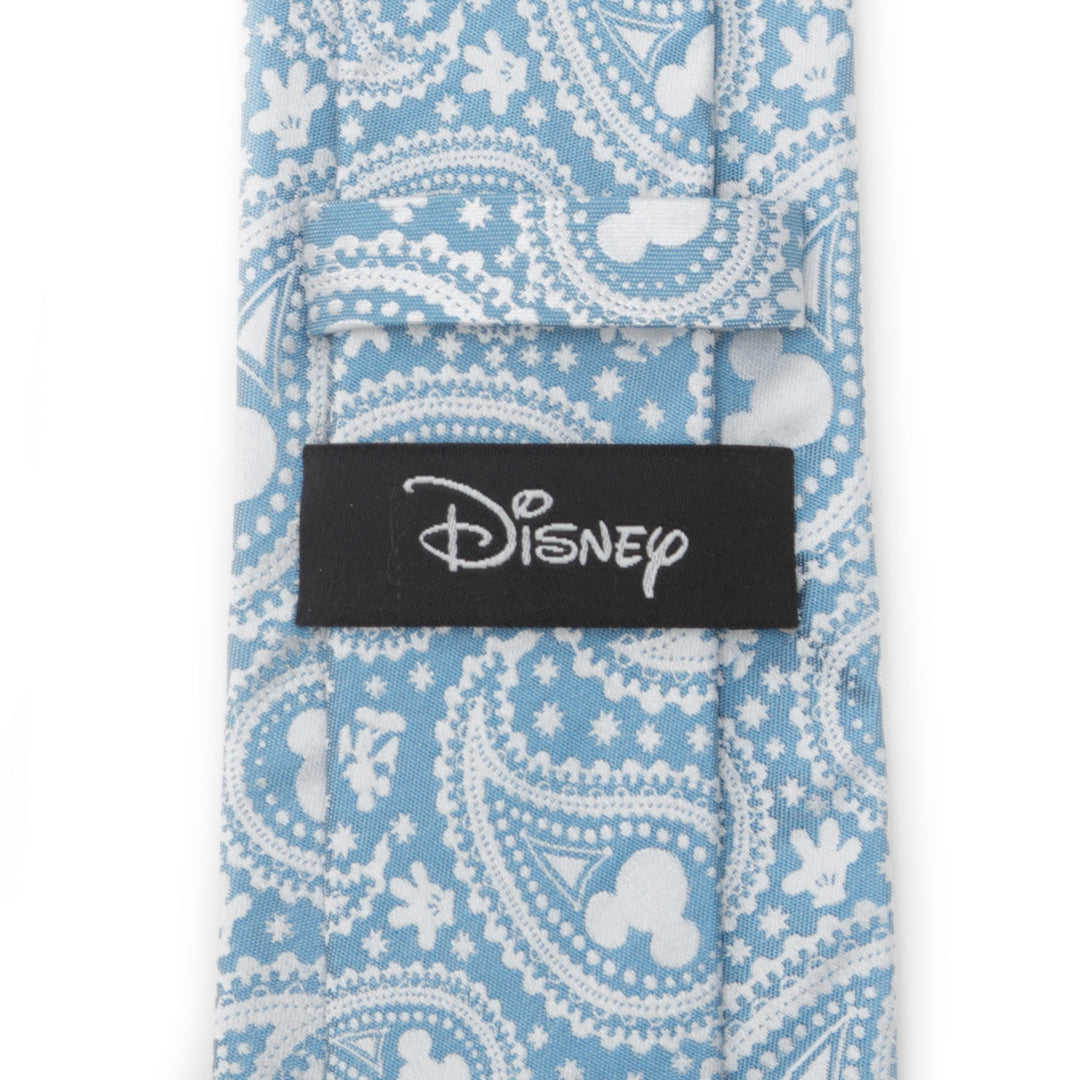 Disney Mickey Mouse Teal Paisley Men’s Tie in light blue with a white pattern and a black Disney label stitched on the back.