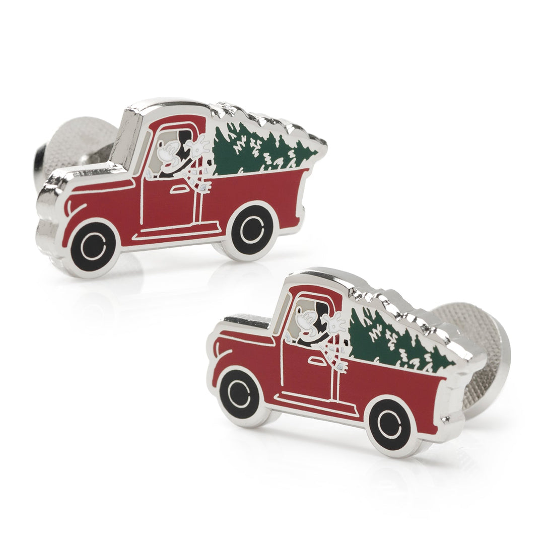 Disney Mickey Mouse Holiday Truck cufflinks featuring silver-tone vintage trucks, each with a character in the driver’s seat and a Christmas tree in the truck bed.