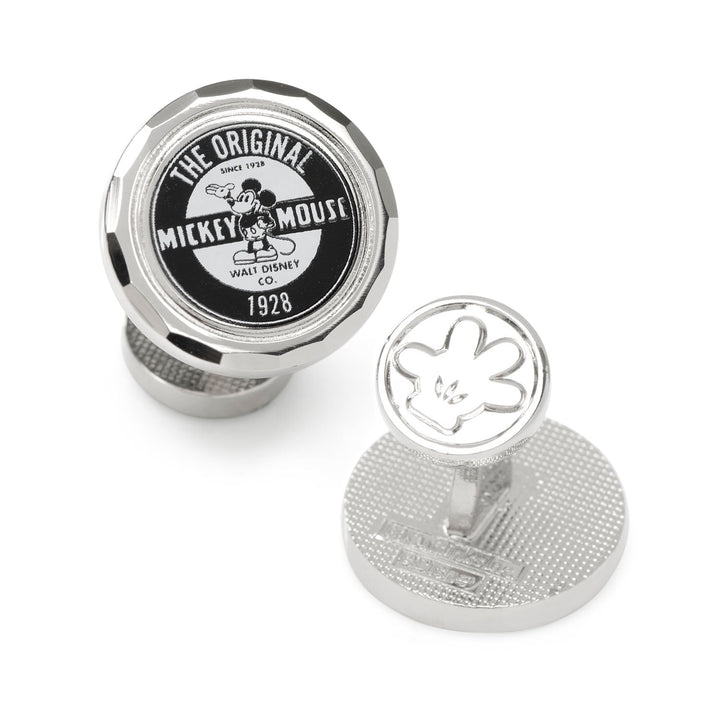 Disney Mickey Mouse Original Cufflinks: a pair of silver-toned cufflinks featuring one black and white emblem and one raised icon of Mickey’s gloved hand.