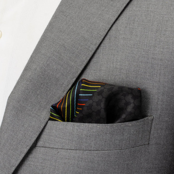Disney Mickey Mouse Silhouette Rainbow Pocket Square featuring a black-on-black repeating silhouette pattern with a rainbow-striped edge, tucked into a grey suit pocket.