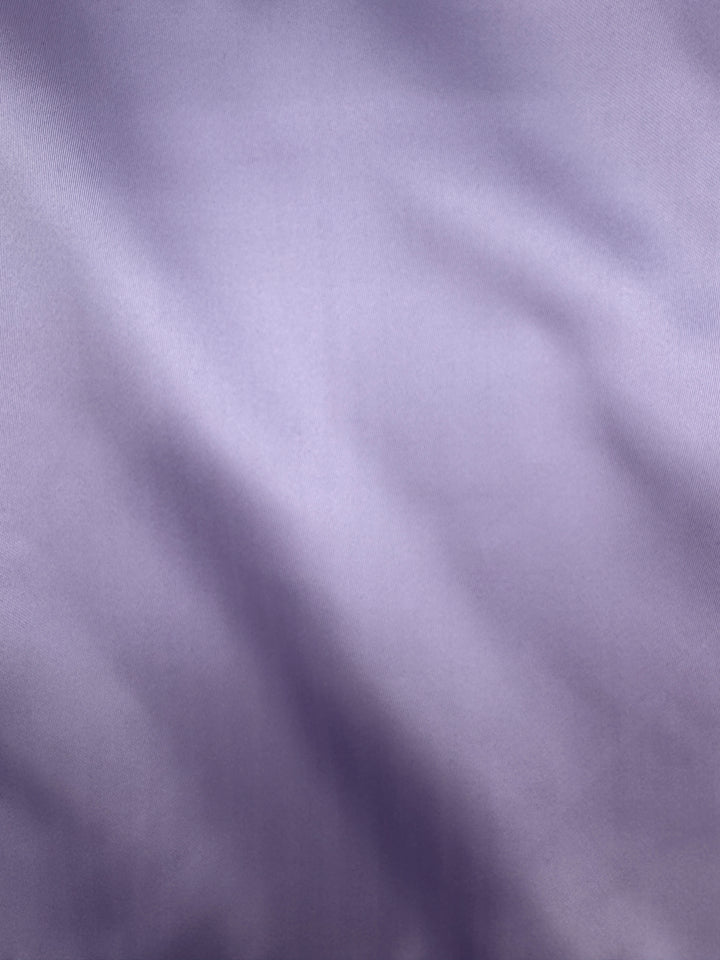 Close-up of the Karako Collecti Lilac Pocket Square Handkerchief, featuring smooth, soft folds and a matte microfiber texture—a refined formal accessory perfect for elevating any ensemble.