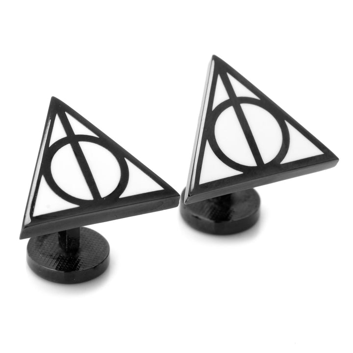 Harry Potter Deathly Hallows cufflinks featuring two black triangular designs with the iconic symbol in white and black.