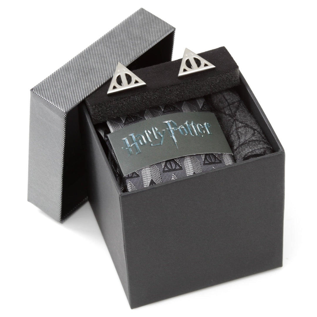 Harry Potter Deathly Hallows Gray Necktie Gift Set featuring a gray necktie with repeating Deathly Hallows symbols and matching metal cufflinks in a gift box.