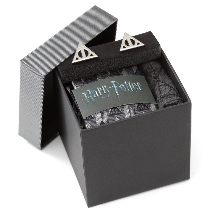 Harry Potter Deathly Hallows Gray Necktie Gift Set featuring a gray necktie with repeating Deathly Hallows symbols and matching metal cufflinks in a gift box.