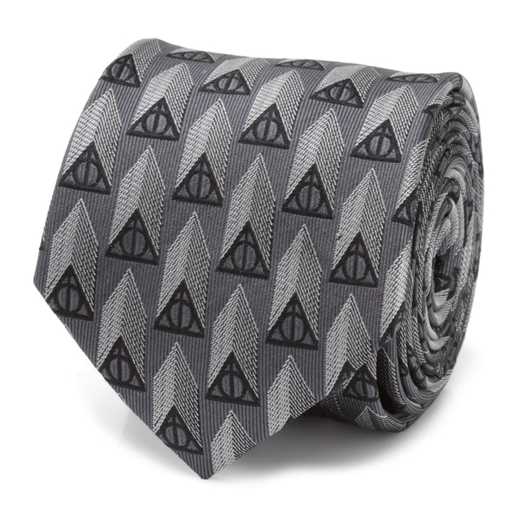 Harry Potter Deathly Hallows Gray Necktie featuring a repeating pattern of dark Deathly Hallows symbols over light gray geometric arrow shapes.