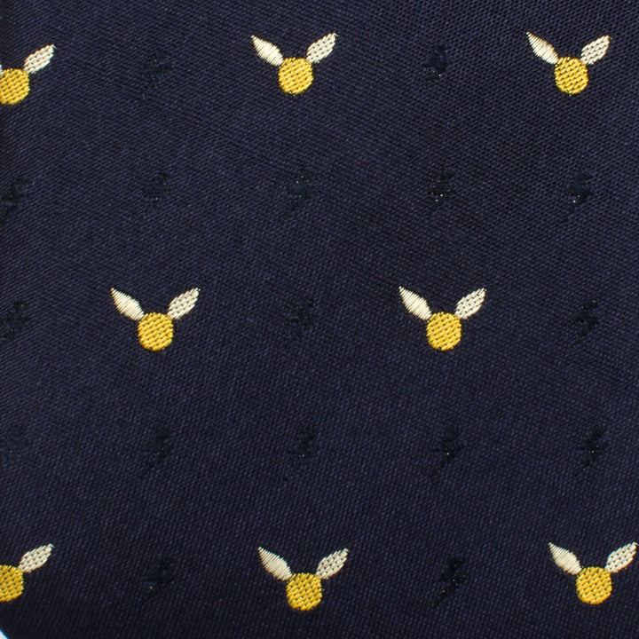 Harry Potter Golden Snitch Dot Tie in dark blue, patterned with small yellow Golden Snitch icons and subtle black lightning bolts.