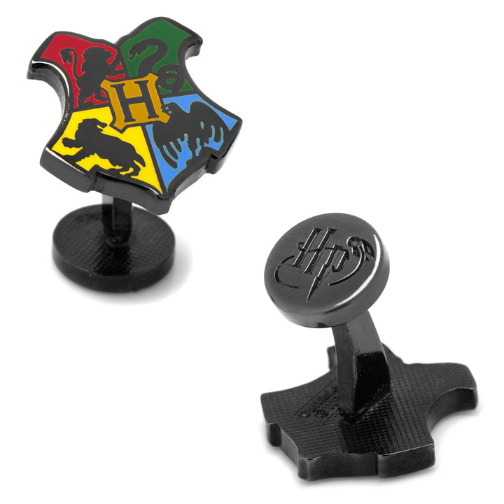 Harry Potter Hogwarts Shield Cufflinks in black metal, featuring one four-quadrant crest cufflink and one circular cufflink with HP initials.