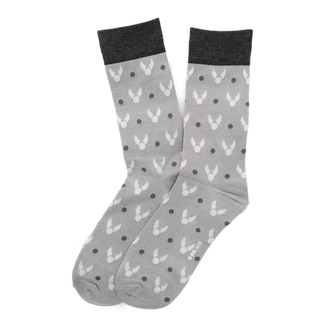 A pair of grey Harry Potter 3 Pack Sock Gift Set crew socks with a repeating pattern of white snitches and dark grey dots, featuring dark grey cuffs.