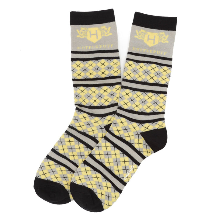 Grey and yellow argyle Hufflepuff socks from the Harry Potter House 4 Socks Gift Set, featuring black cuffs, heels, toes, and the house crest at the top.