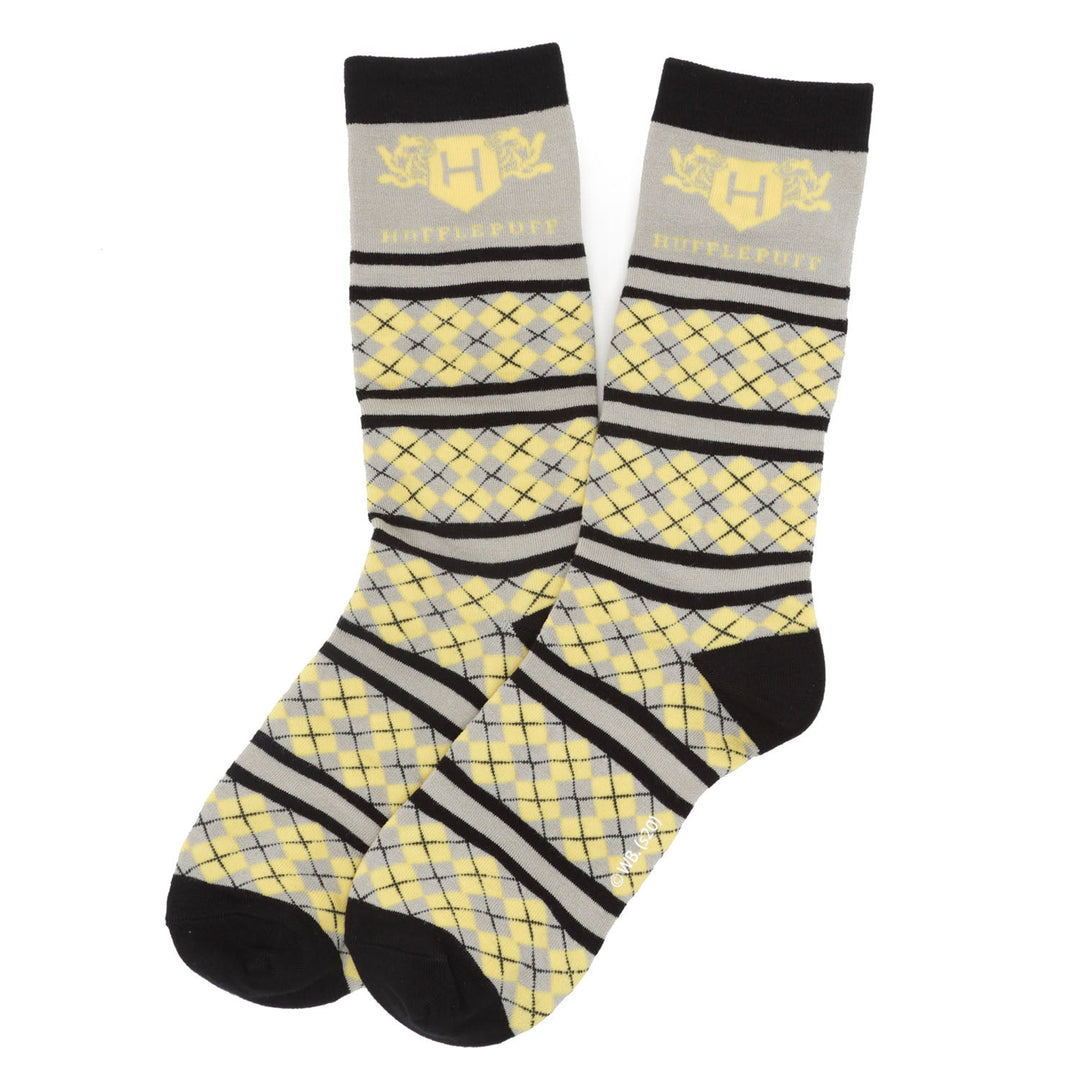 Harry Potter Hufflepuff Men’s Sock in grey, yellow, and black argyle, featuring the house crest and name at the cuff.