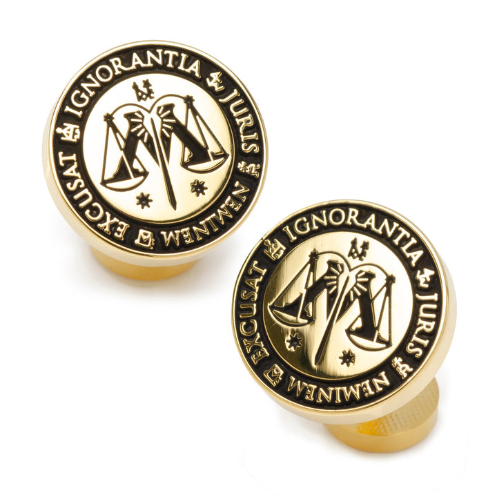 Harry Potter Ministry of Magic Wizengamot Cufflinks in gold-tone, featuring a scales of justice emblem and the black Latin inscription “Ignorantia Juris Neminem Excusat.”