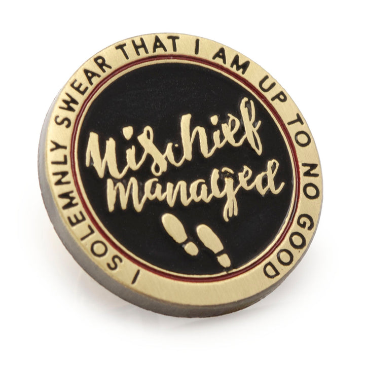 Harry Potter Mischief Managed Gold Lapel Pin featuring a round metal design with a black center, “Mischief Managed” text, two footprints, and the phrase “I Solemnly Swear That I Am Up To No Good.”