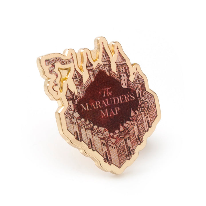 Gold-tone metal Harry Potter Marauder’s Map Lapel Pin shaped like a castle, featuring a central dark red crest labeled “The Marauder’s Map.”