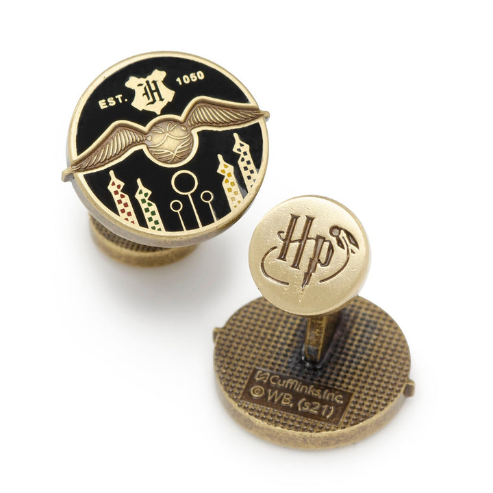 Harry Potter Quidditch Field Cufflinks: one circular cufflink featuring a winged ball over a Quidditch field, the other featuring an HP logo.