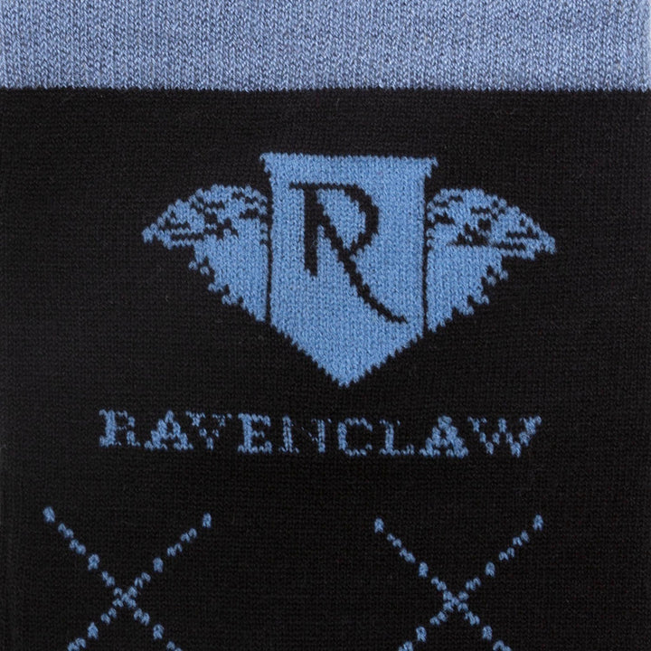 Harry Potter Ravenclaw Men’s Sock featuring the blue house crest, “RAVENCLAW” text, and a subtle blue geometric pattern on black fabric.