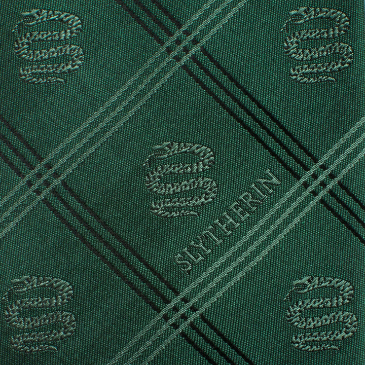 Harry Potter Slytherin Plaid Tie in green, featuring a black diagonal pattern with repeating serpent emblems and the word “SLYTHERIN.”