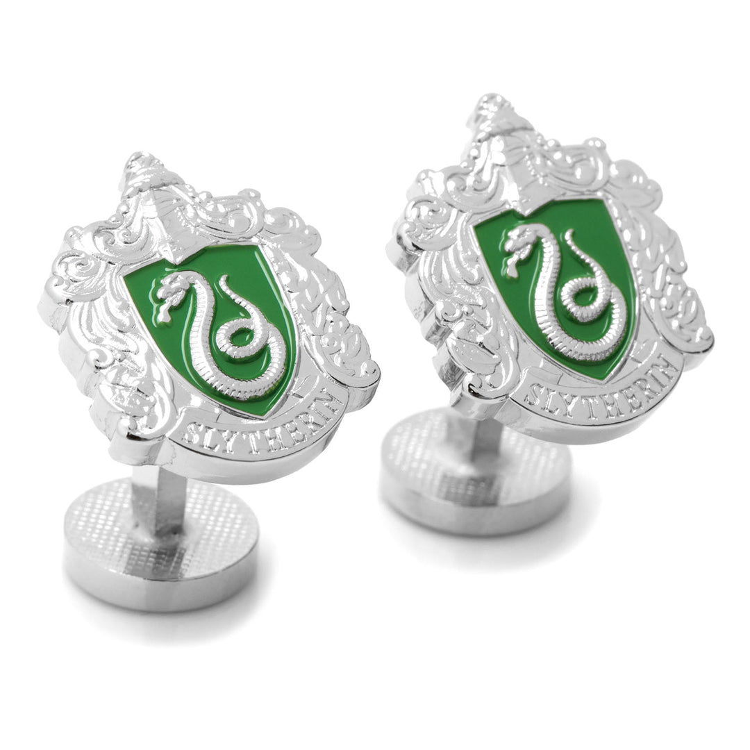 Harry Potter Slytherin Crest Cufflinks in silver-tone featuring a green crest with a silver snake and the word “Slytherin” at the base.