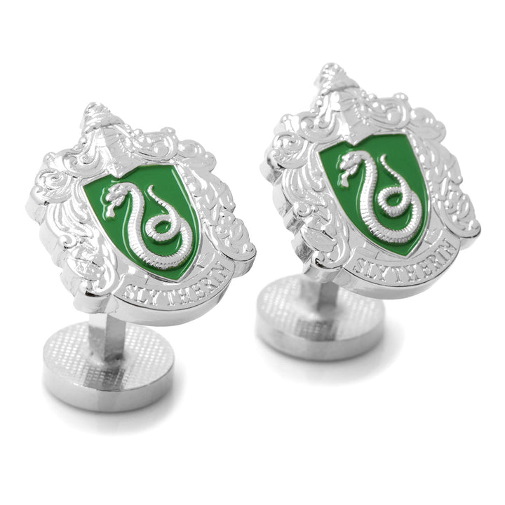 Harry Potter Slytherin Crest Cufflinks in silver-tone featuring a green crest with a silver snake and the word “Slytherin” at the base.