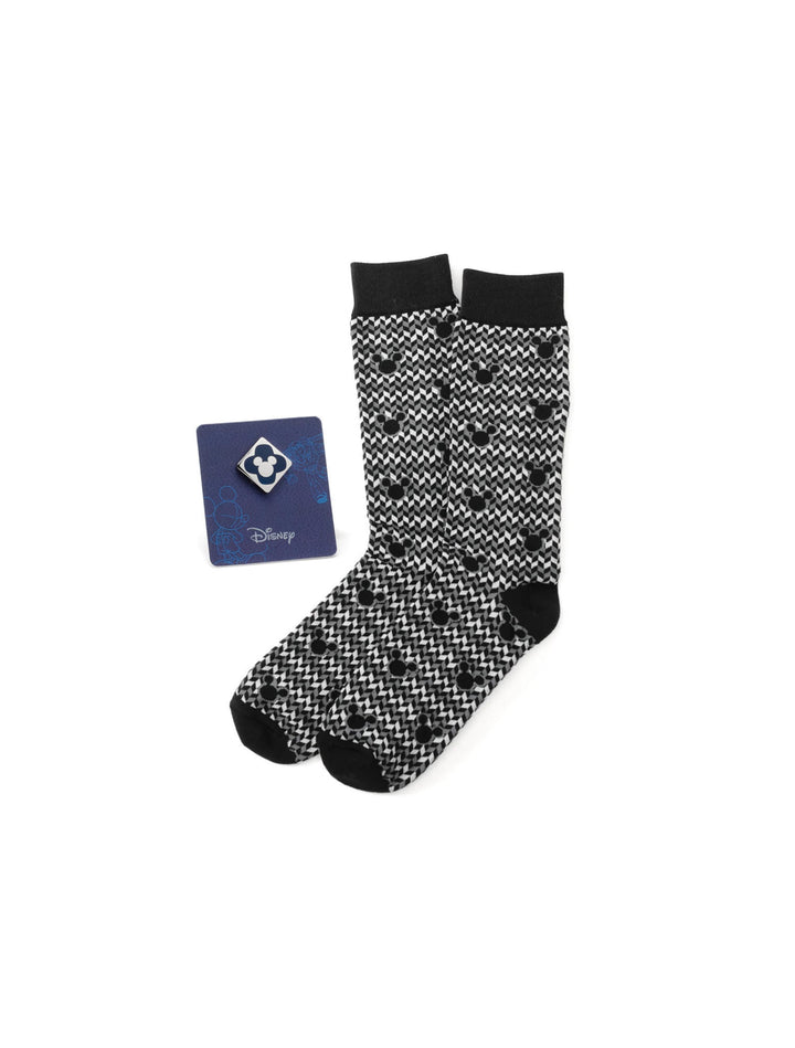 Disney Mickey Mouse Silhouette Chevron Sock and Mickey Blue Lapel Pin Gift Set featuring a pair of black and white chevron socks with Mickey silhouettes and a square blue Mickey Mouse lapel pin.