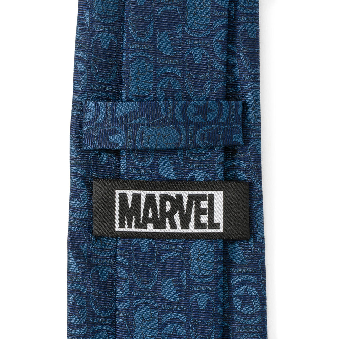 Marvel Avengers Men’s Blue Tie in a blue silk blend featuring a tonal pattern of Avengers character masks and logos, with a Cufflinks.com brand label stitched to the back.