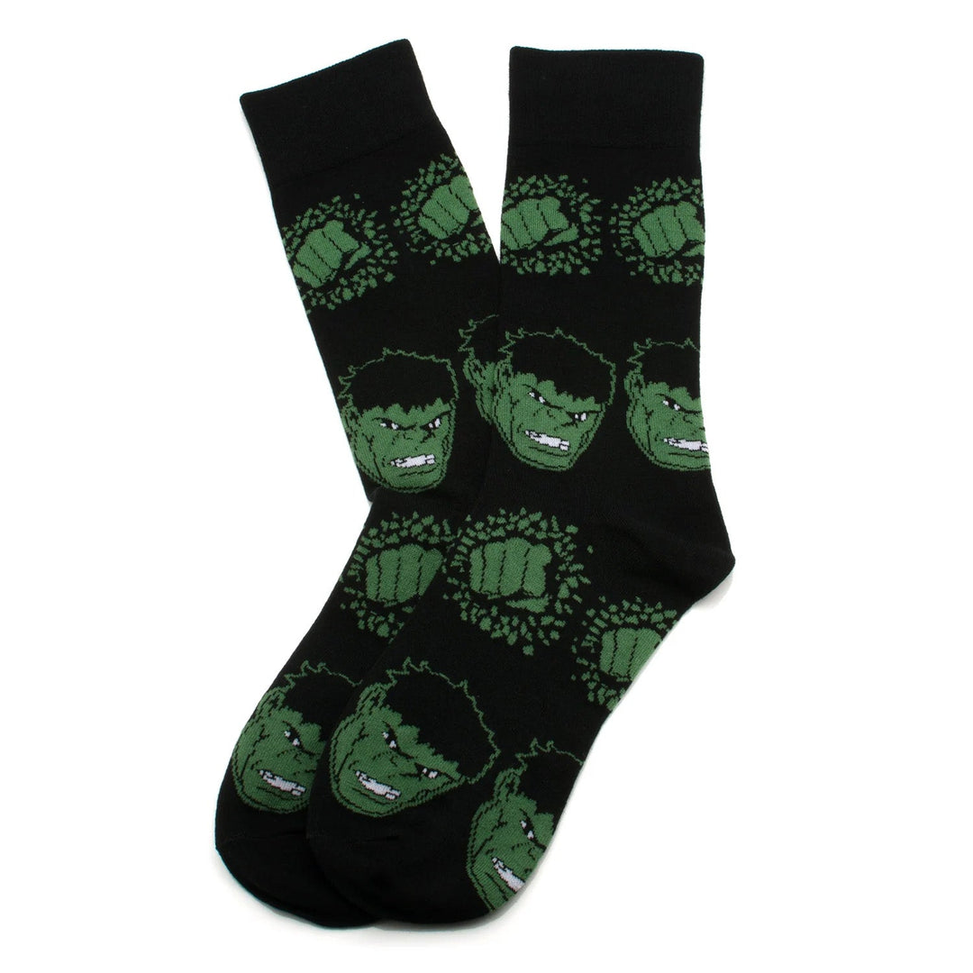Black crew socks from the Marvel Avengers Favorites 3 Pair Socks and Lapel Pin Gift Set featuring a repeating pattern of the Incredible Hulk’s face and green fists.