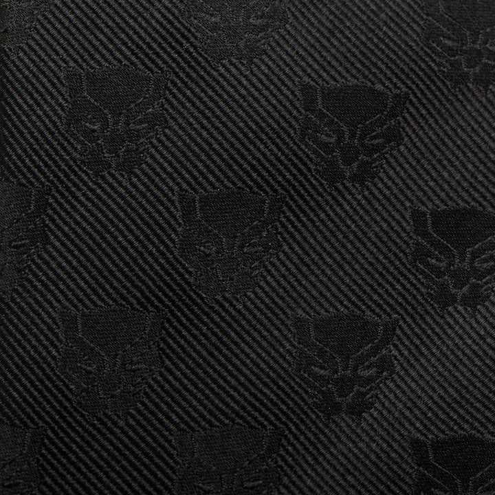 Marvel Black Panther Men’s Tie in black fabric with a diagonal weave and repeating tone-on-tone panther mask motif.